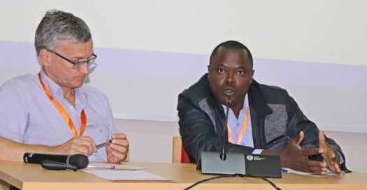 George Momanyi emphasizes a point during the panel discussion (A. Ndayisenga)
