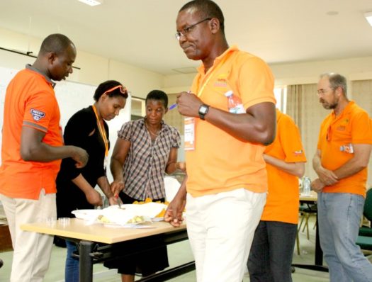 Dorcus Gemenet serves up sweetpotato during a taste test in Uganda in 2016 (Photo: C. Bukania)